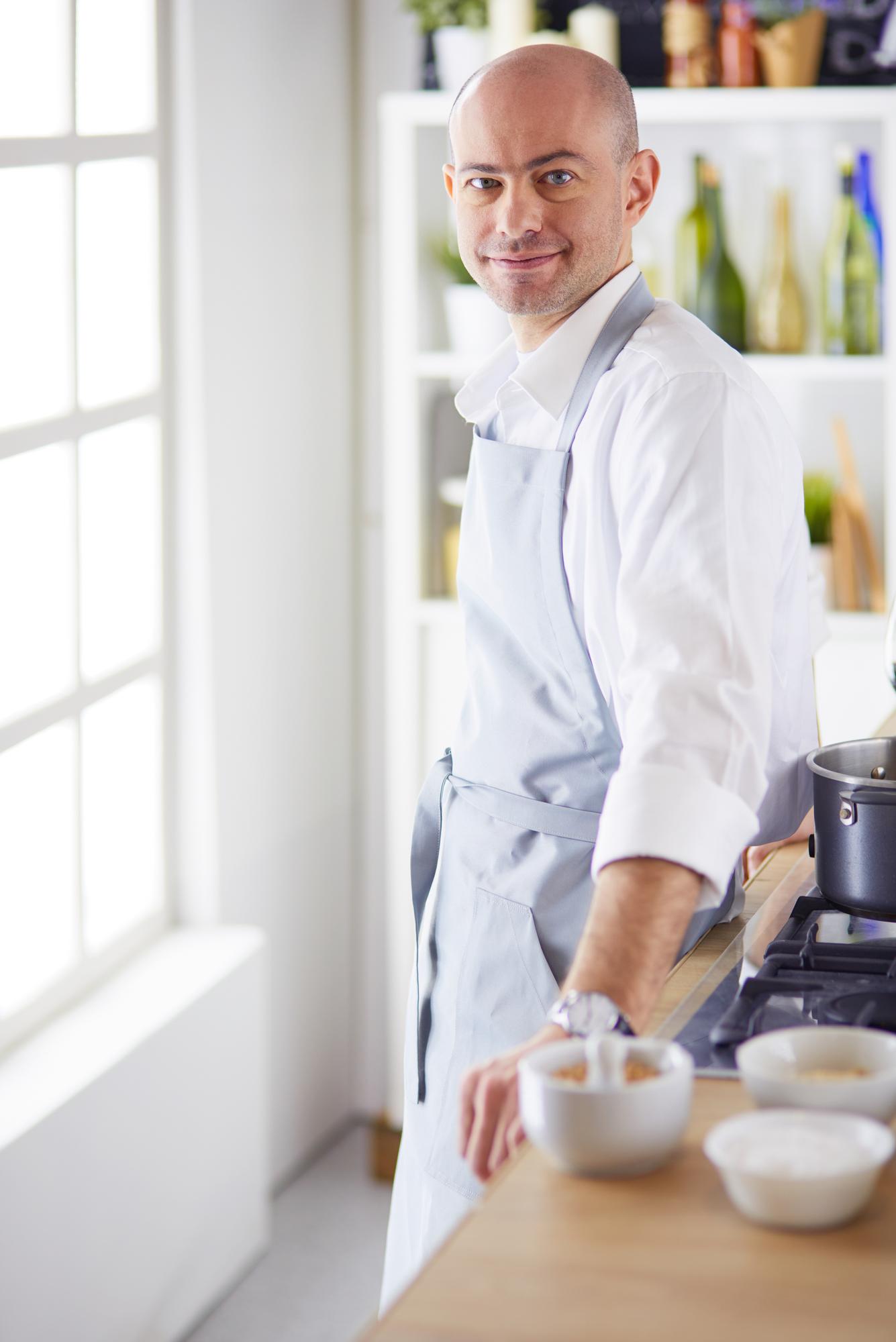 Chef smiling in workshop kitchen