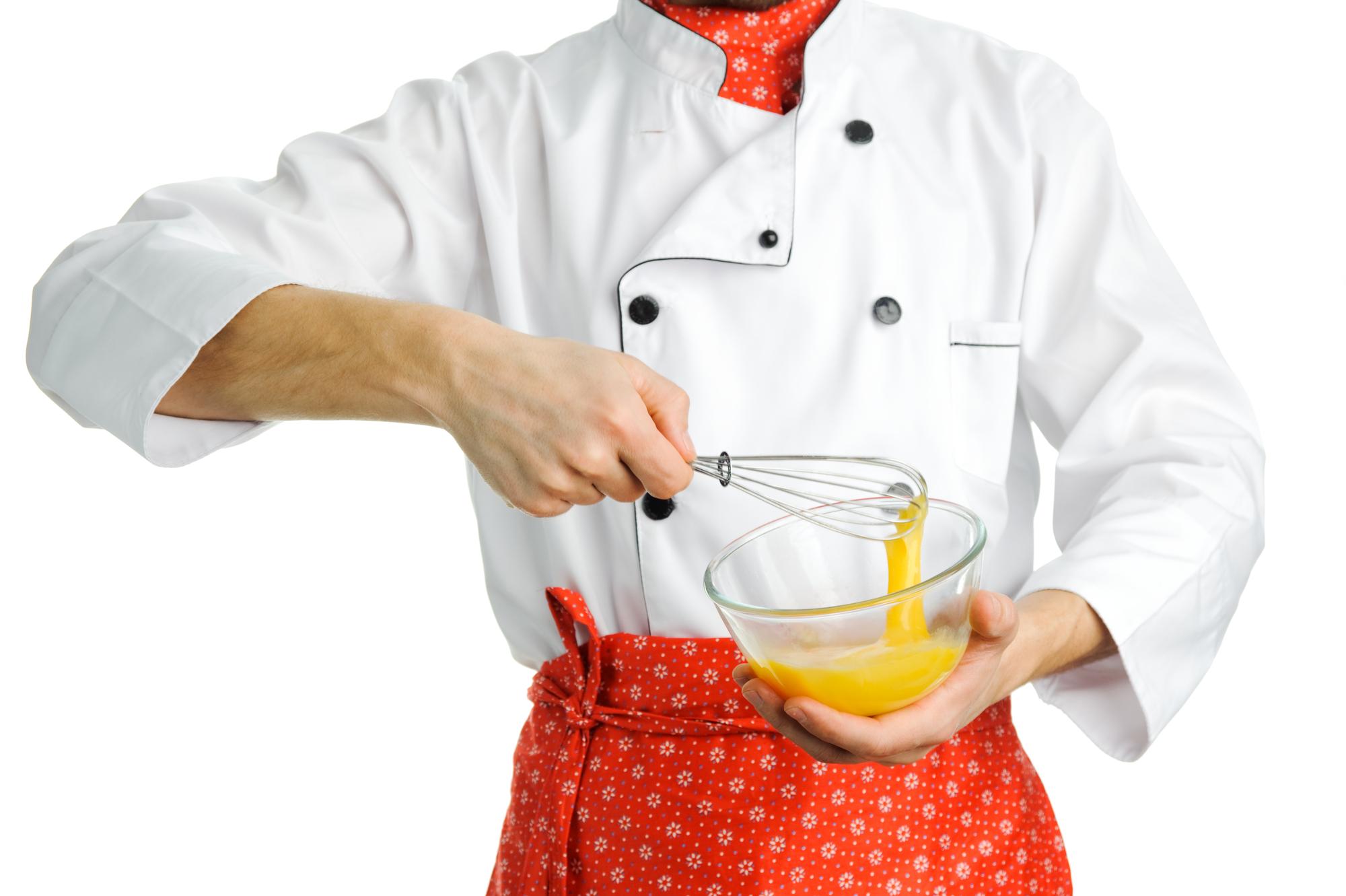 Chef hands plating dessert
